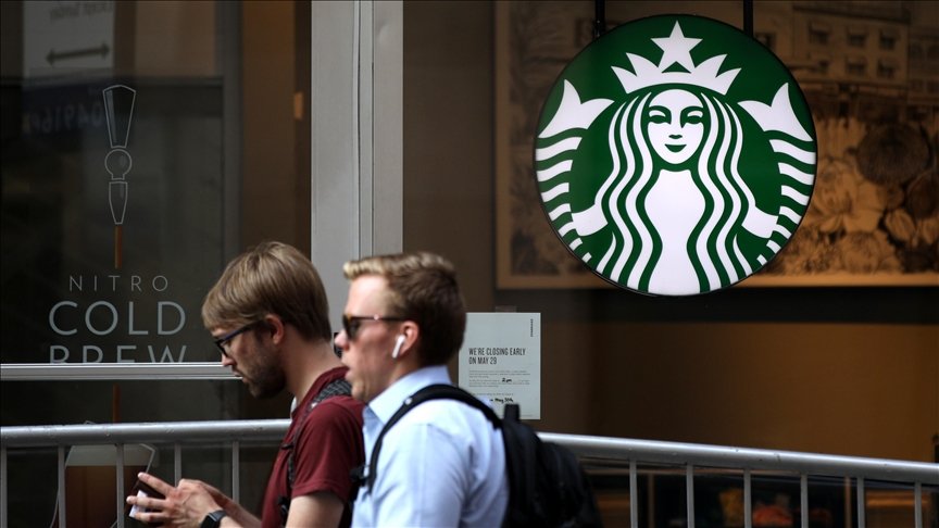 Starbucks trims staff and expenses as sales dip