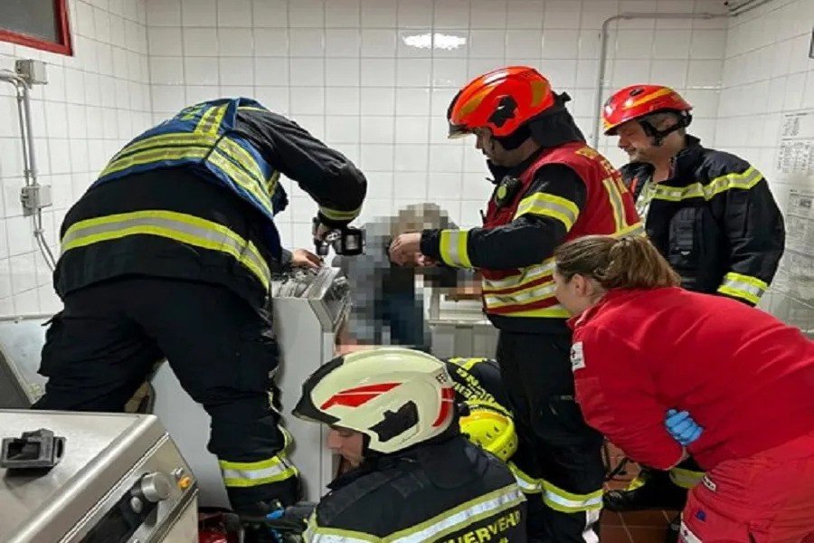 Teen girl rescued from clothes dryer after tense operation